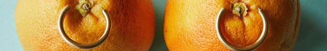 Intimpiercing Ringe an Orangen